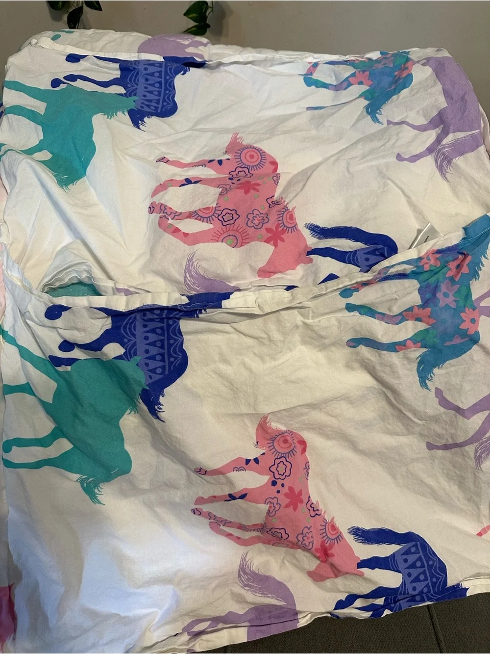 Comforter with horse print